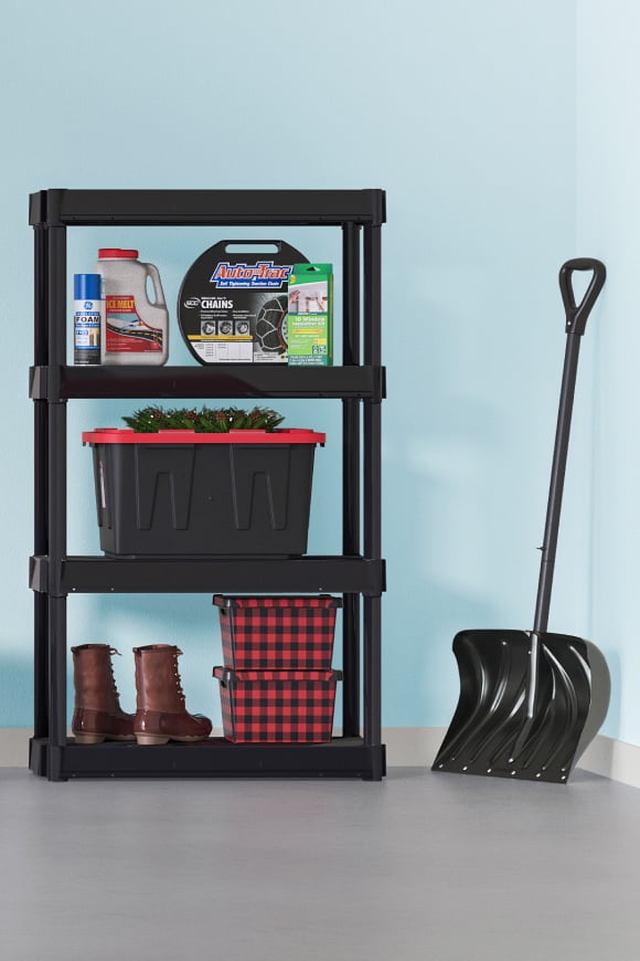 Snowblower, generator, shovel & storage shelves with bins of cold-weather gear.