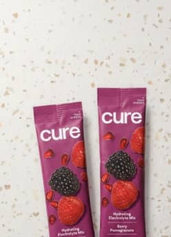 Berry-flavored Cure hydration packets.