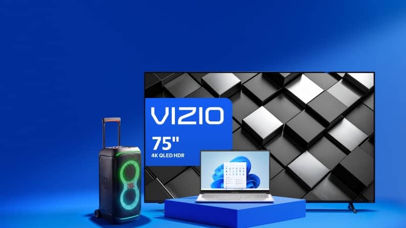 Vizio seventy five inch 4K OLED HDR TV with laptop and light up speaker.