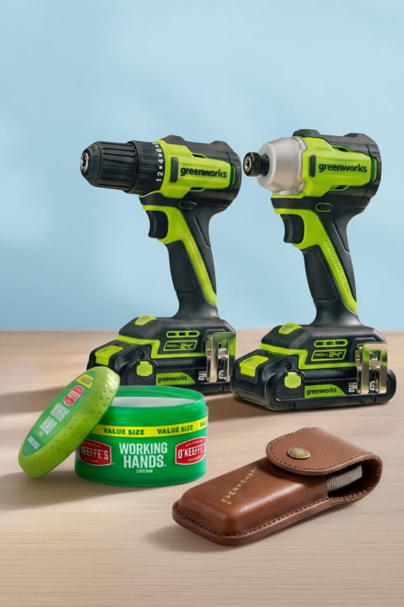 Brown tool holder, Working Hands powder, two power drills.