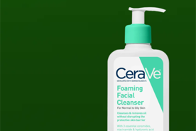 Image shows a white CeraVe Foaming Facial Cleanser bottle with a green pump on a dark green background.