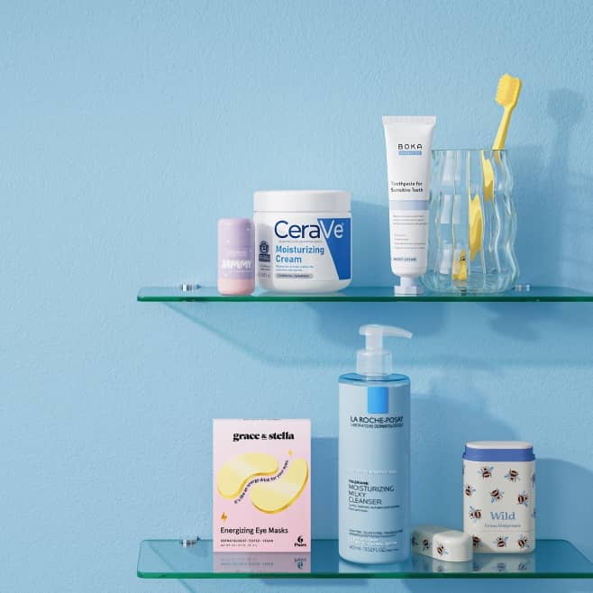 Bathroom shelves with a Jammy lip mask, CeraVe lotion, Boka toothpaste, Grace and Stella eye masks, LaRoche-Posay cleanser and Wild deodorant.