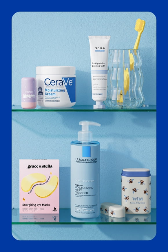 Bathroom shelves with a Jammy lip mask, CeraVe lotion, Boka toothpaste, Grace and Stella eye masks, LaRoche-Posay cleanser and Wild deodorant.
