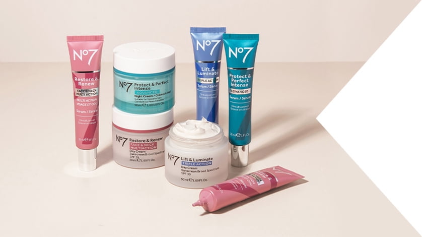 A group of Number seven skincare products standing in a beige room