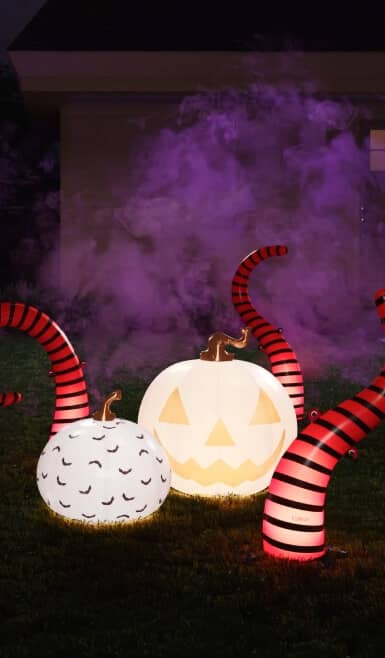 Inflatable pumpkins and striped tentacles.