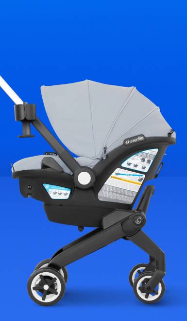 Image shows a black and gray baby stroller.