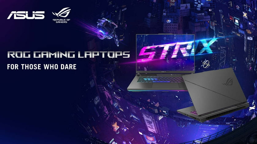 A showcase of ROG Strix laptops against a futuristic cityscape background.