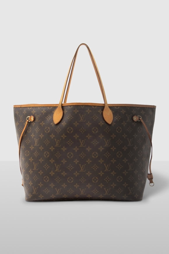 Louis Vuitton brown monogram tote bag with tan leather handles and side drawstrings.