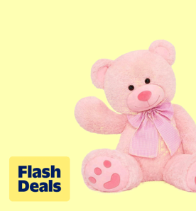 Flash deals. Image shows a pink MorisMos giant teddy bear plush with a bow, set against a pale yellow background.