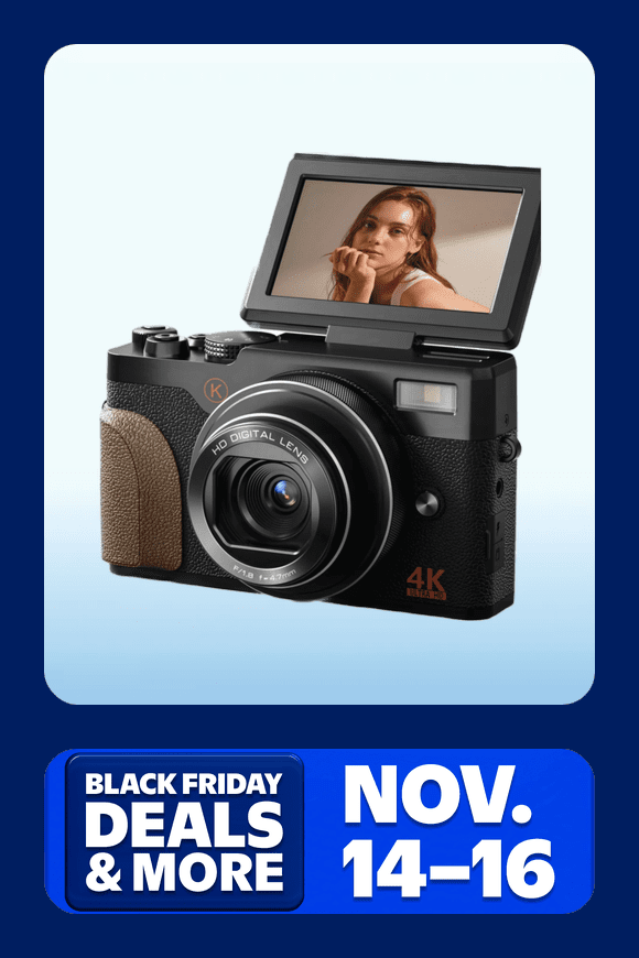 Image shows a black and brown NBD digital camera with a flip screen on a gradient light blue background, framed by a dark blue border.