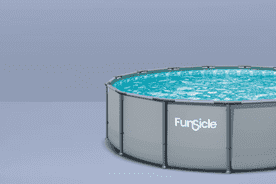 Image shows a round, gray Funsicle 15-foot above-ground metal frame swimming pool filled with water on a light blue background.