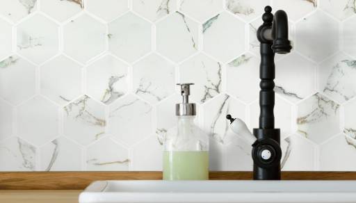 Lifestyle shot. Kitchen counter & sink with hexagona marble wallpaper.