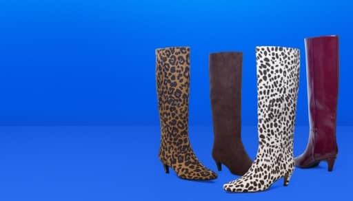 Tall women’s boots in four different designs: burgundy leather, brown suede, leopard and dalmatian prints.