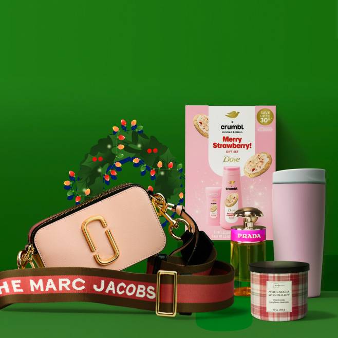 View a Marc Jacobs shoulder bag, Crumbl-themed body care set by Dove, Prada perfume, Mainstays candle and a tumbler.