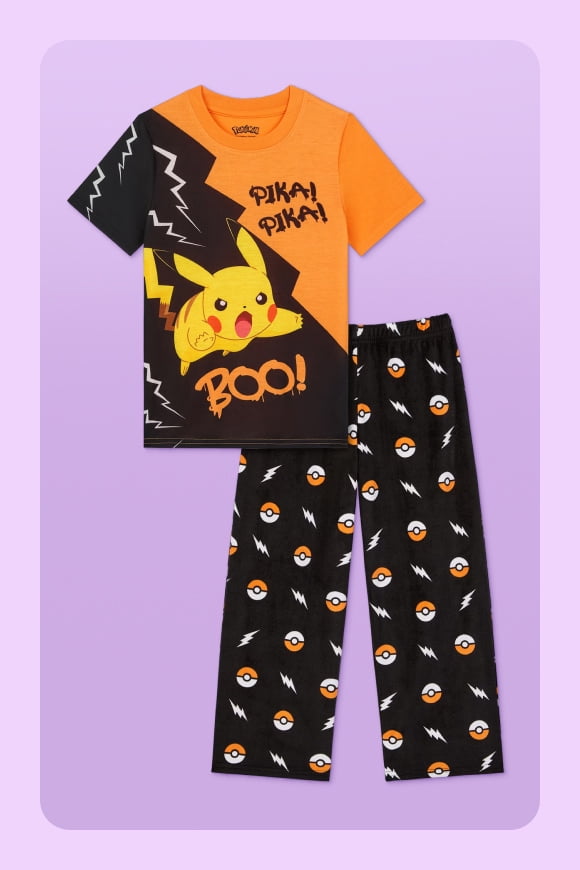 A set of children’s Pikachu pajamas is next to navy blue bat illustrations.