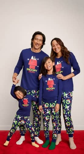 From fifteen dollars. A family of four wearing matching Snoopy pajamas is pictured on a beige backdrop.