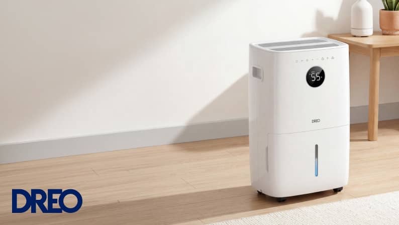 A white air purifier set in a sunny living room.