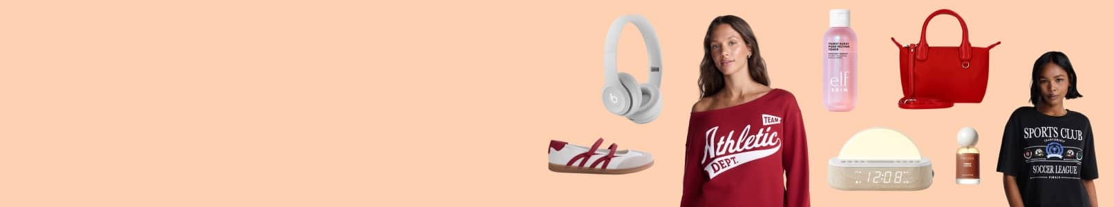 College themed apparel, shoes, headphones, skincare, a candle and a red handbag arranged beside two adults.
