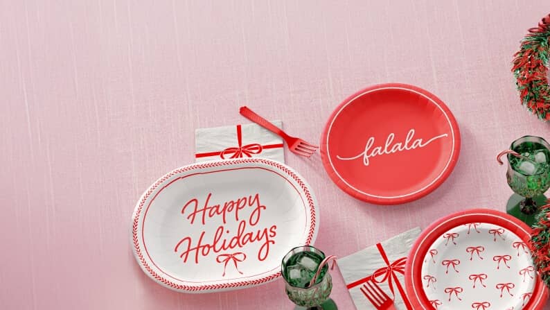 Image of holiday-themed paper plates, napkins and cutlery.