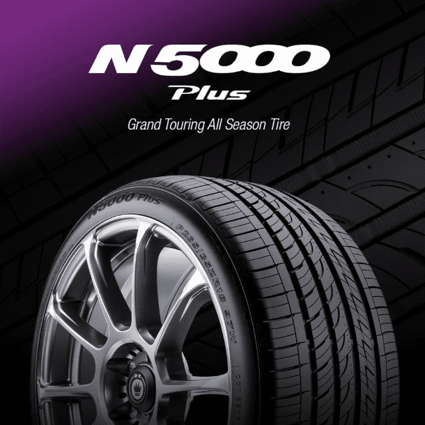Image shows a black N five thousand Plus Grand Touring All Season Tire on a black background.