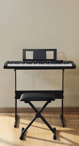 A keyboard with a matching stool.