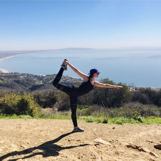 Taylor stretching on a running trail