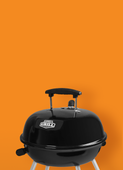A black grill on an orange background.