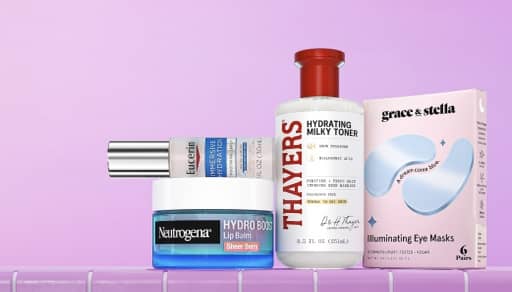 A product shot with a Eucerin serum bottle, Neutrogena Hydro Boost lip balm, Thayers Hydrating Milk Toner, and Grace & Stella eye mask patches.