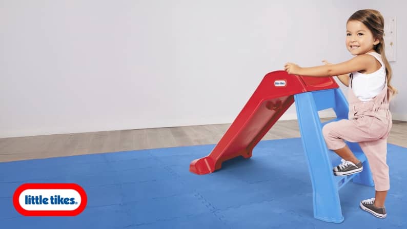 Fun that never gets old. Timeless toys from Little Tikes. Image shows a little girl stepping onto a Little Tikes slide. A Little Tikes logo is shown.