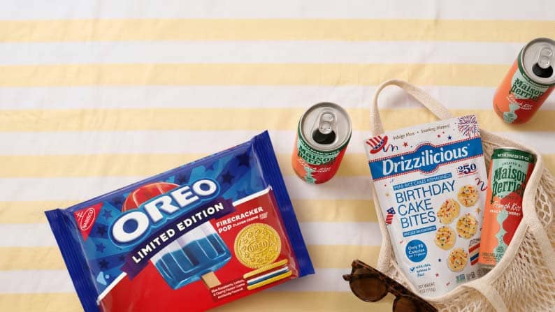 Oreo limited edition firecracker pop cookies, Maison Perrier French Kiss peach-cherry sparkling water, and Drizzilicious birthday cake bites.