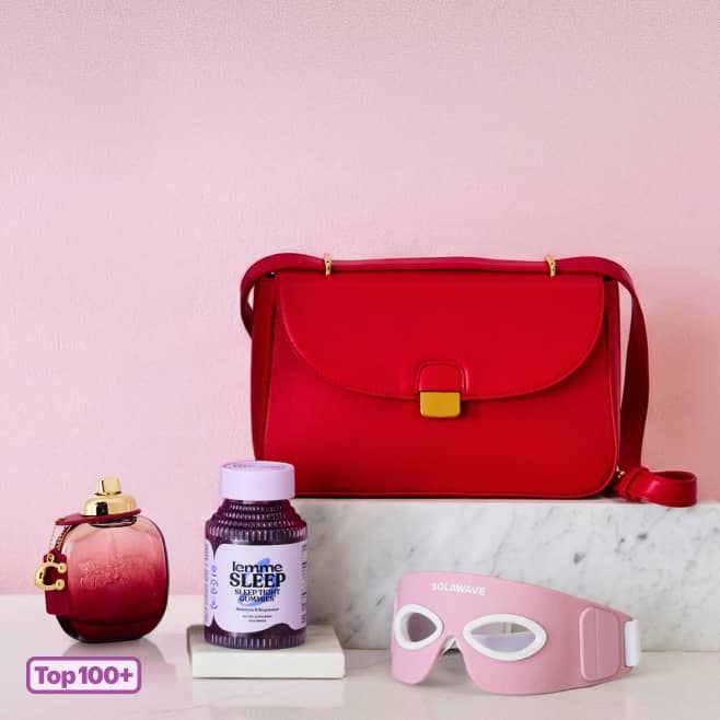 Top one hundred plus. Red crossbody bag, bottle of perfume, Lemme Sleep gummies, Solawave eye mask.