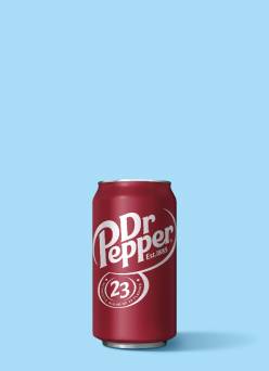 A can of Dr. Pepper against a light blue background.