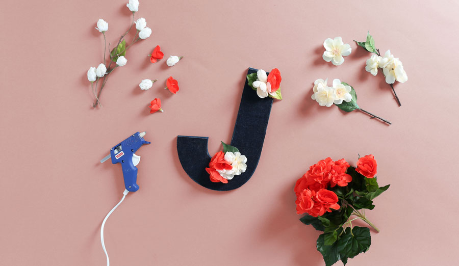 gluing flowers into place