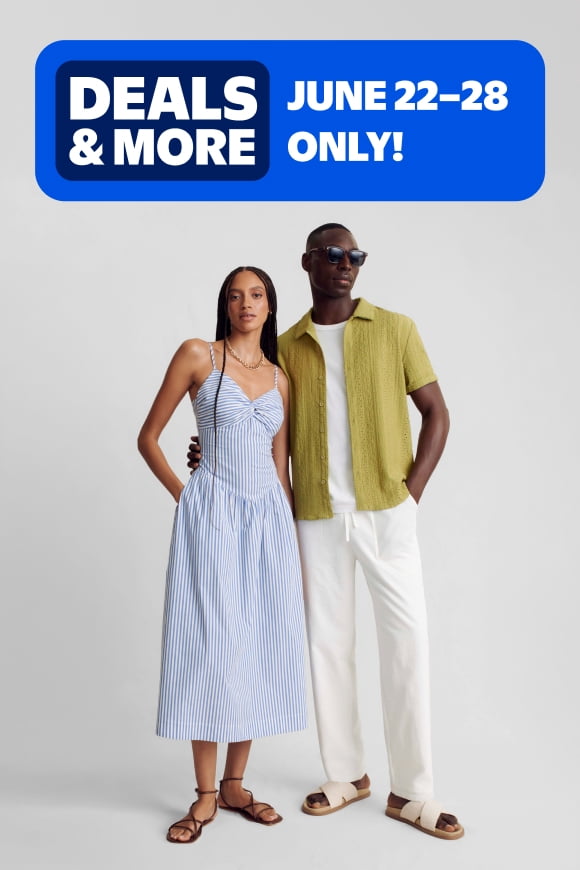 A model in a dress & a model in an overshirt and pants.