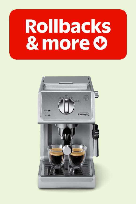 Image shows a silver De'Longhi espresso and cappuccino machine on a light green background.