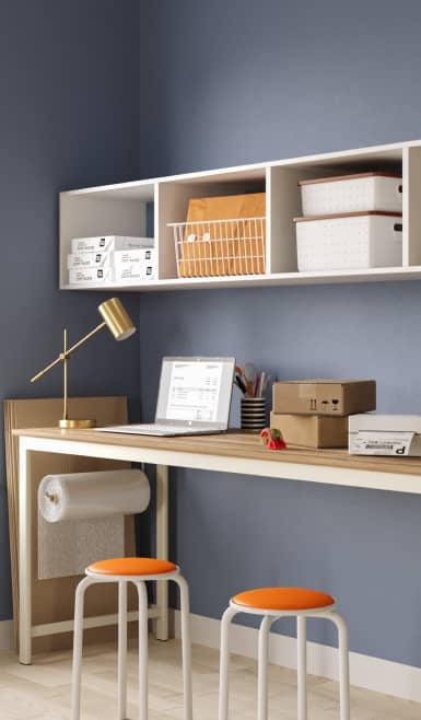 Home office set up featuring office storage and organizational items.