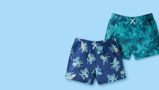 Two pairs of boys patterned swim trunks.