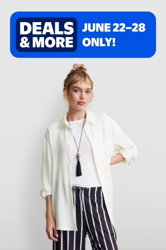 A model in a Fantaslook white shirt and striped pant.