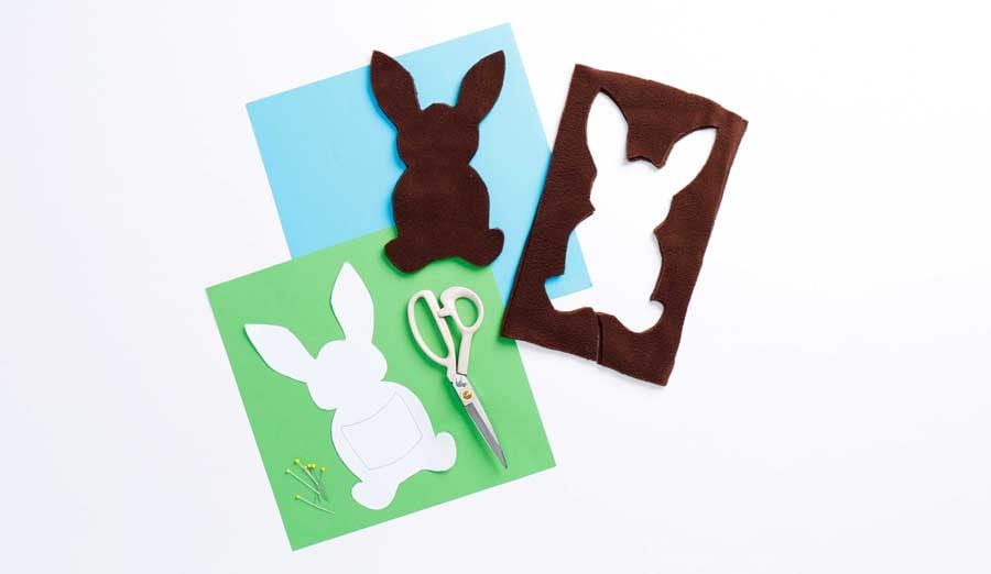 Step 2 - pieces of brown fleece in bunny shapes stacked