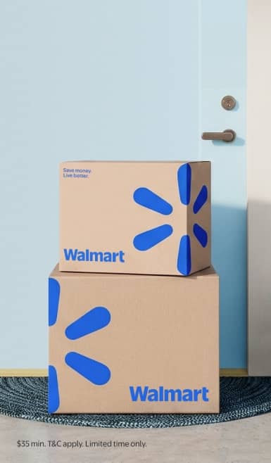 Two Walmart delivery boxes on a front porch. $35 minimum. Terms and conditions apply. Limited time only.