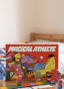Magical Athlete board game box featuring colorful illustration of wacky characters.