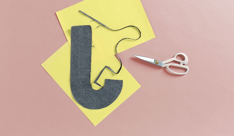 Trimming letter with dried Mod Podge