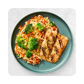 A prepared plate of grilled salmon, fried rice and broccoli is shown.