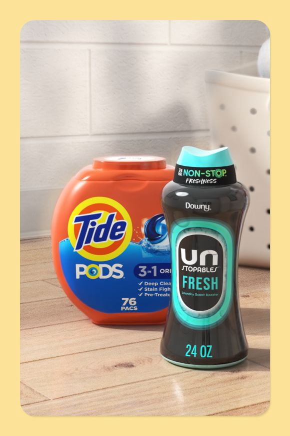 Tide detergent pods and Downy Unstoppables fresh scent booters.
