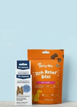 A light blue square tile featuring PetHonesty supplements and an orange pouch of Zesty Paws Itch Relief Bites.