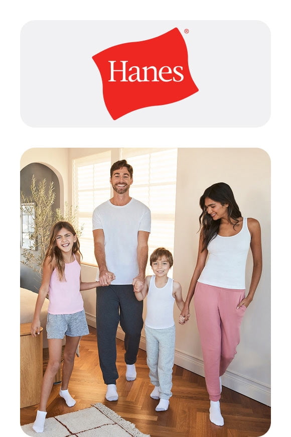 Multi-generational family of four wears Hanes casual tees, tank tops, sweatpants, and lounge shorts walking inside a bright bedroom.