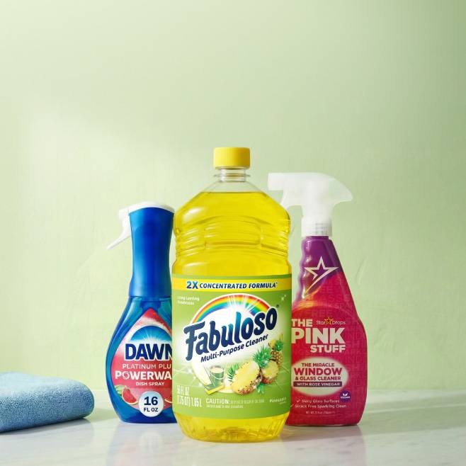 Fabuloso, Dawn Dish soap and The Pink Stuff in a kitchen setting.