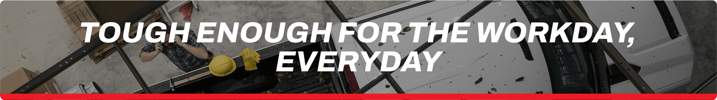 A truck at a construction site with the text Tough Enough For the Workday, Everyday.