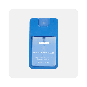 Image shows Scent Theory hand sanitizer in a blue bottle against a white background.