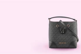 A handbag by Michael Kors is shown.